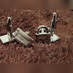 Assorted Stainless Steel Cufflinks, tie bars, and a box